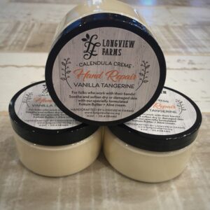 Three jars of lavender-scented body butter with vanilla and chamomile.