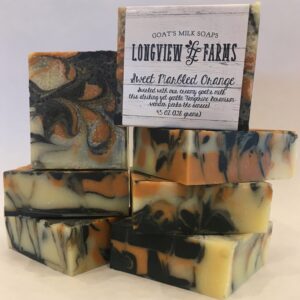 Handmade artisan soaps with natural swirls and earthy tones.