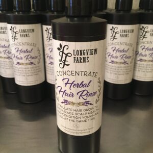 Bottle of herbal hair tonic from Livingston Farms Concentrate.