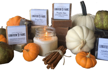 Autumn-themed candles and soaps with pumpkins.