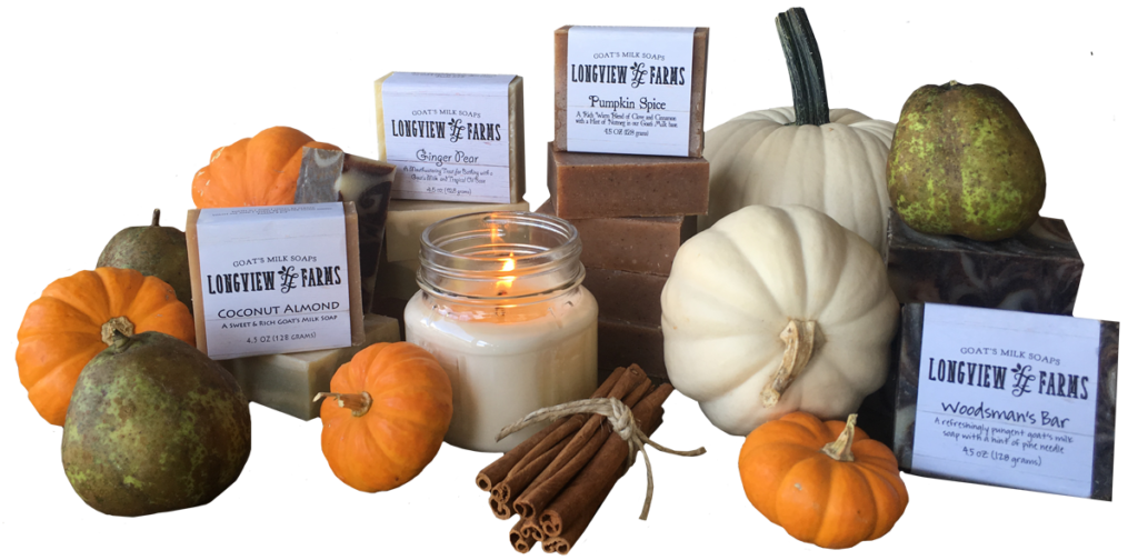 Autumn-themed candles and soaps with pumpkins.