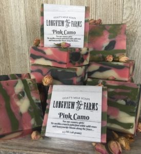 Pink camo goat's milk soap bars displayed.