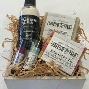 Gift box with lip gloss and two lavender sachets.